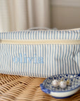 light blue striped embroidered monogram train case