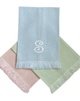 Monogrammed Fringe Guest Towels in pink, blue, and green